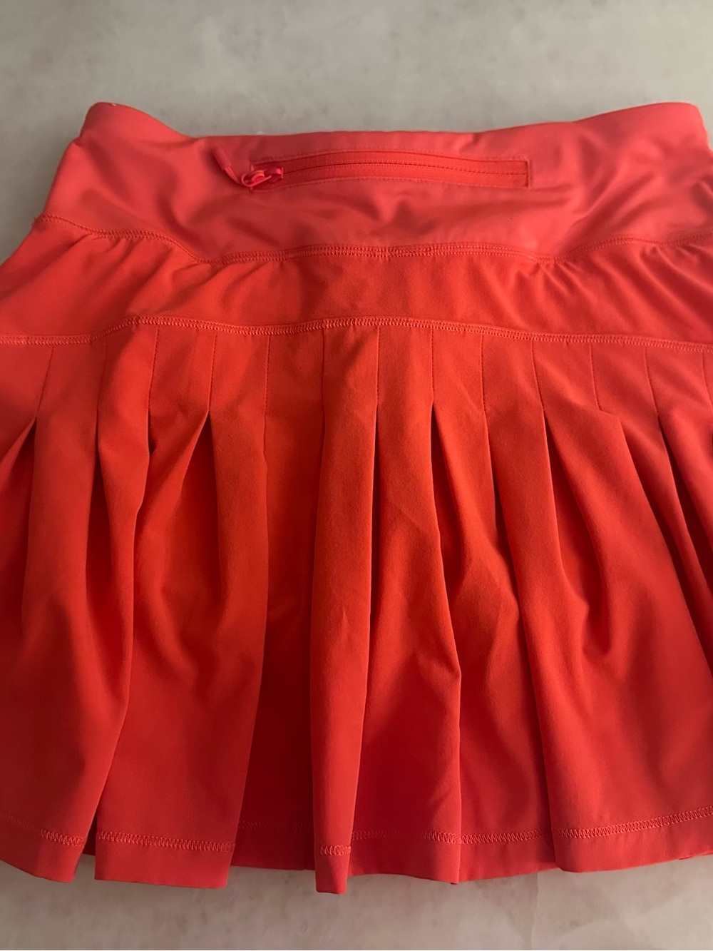 Coral Pleated Lululemon Athletic Skirt with Back Zip Pocket